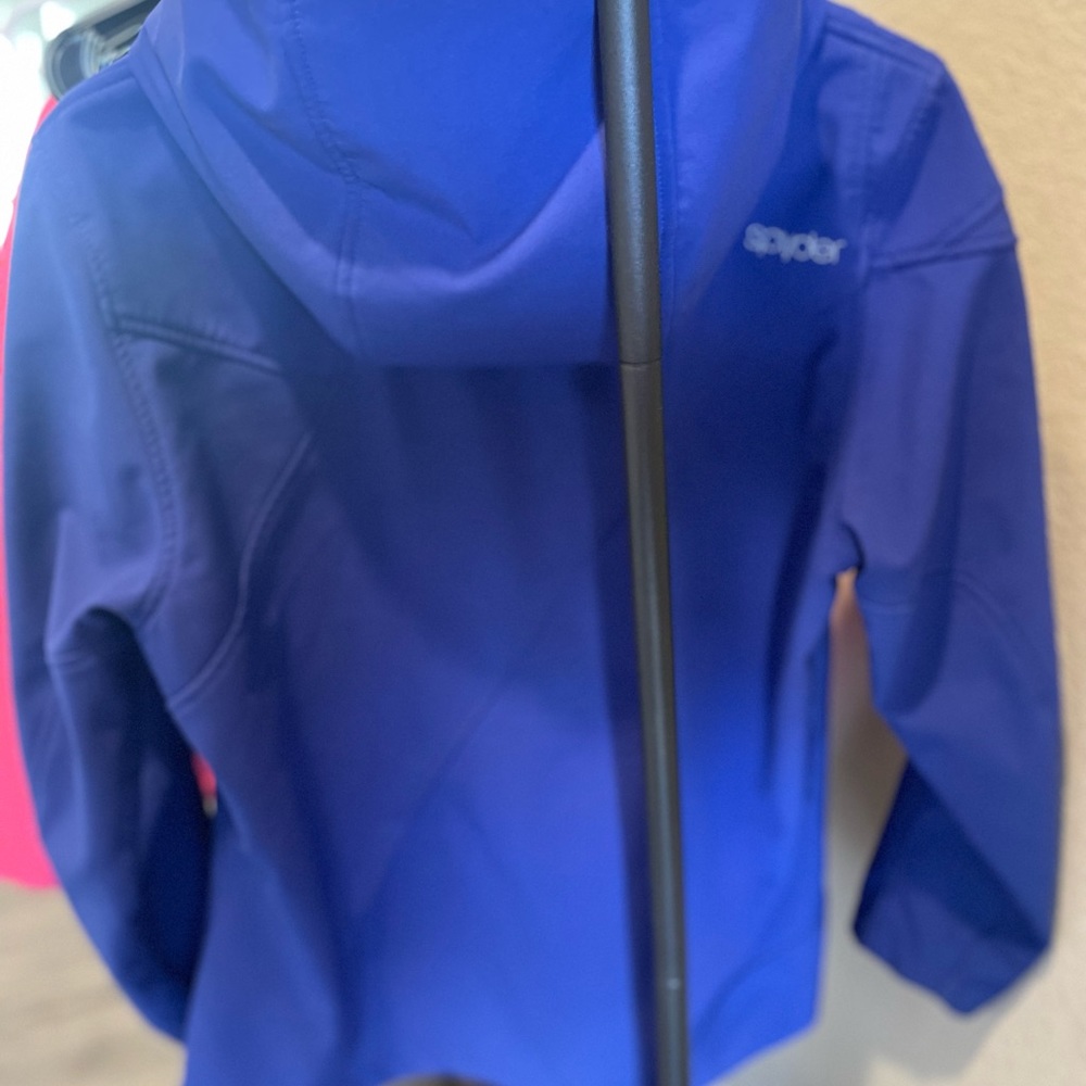 Women’s xl spider jacket blue used condition.